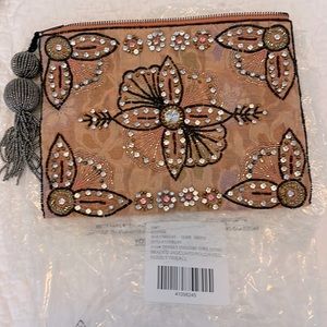 Anthropologie Dress clutch with detailed beading and rhinestone.